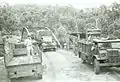 Dutch military convoy passes a bridge near Cipanas c. 1946 during Indonesian National Revolution