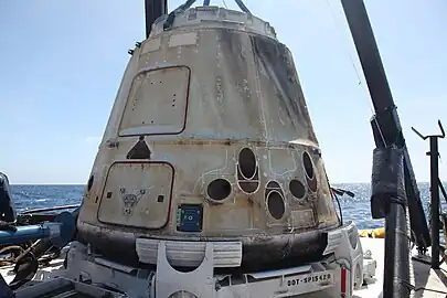 Dragon after reentry and splashdown