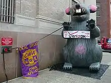 Image 37AFL–CIO unions protest outside Verizon headquarters in Philadelphia using a giant inflatable rat.