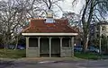 Cabman's Shelter, built for drivers of horse-drawn cabs in the square, now located in Christchurch Park.