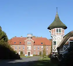 The boarding school in the castle with the half-timbered dovecot