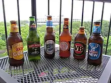 Six stubbies of different Australian beers.