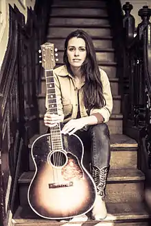 Caitlin Canty with Recording King guitar.