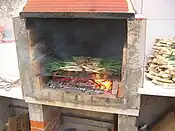 Calçots roasting during a calçotada