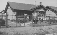 Simple low cost bungalow style home of timber, featuring imported redwood framing and terracotta tiled roof. Moonee Ponds, Victoria, built around 1928