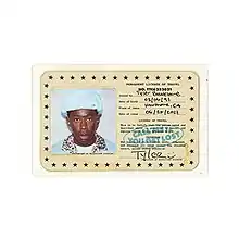 White background with a beige identification card centered. The identification card displays the name "Tyler Baudelaire" as well as a photo of Tyler.