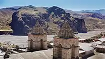 The Callalli Church with rock formation in the background