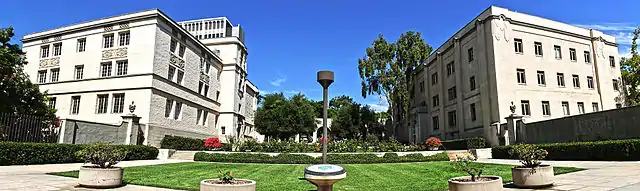 Caltech entrance at 1200 E California Blvd. On the left is East Norman Bridge Laboratory of Physics and on the right is the Alfred Sloan Laboratory of Mathematics and Physics.