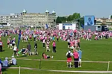 Race for Life 2011 at Parker's Piece. The turreted building in the background is the De Vere University Arms Hotel.