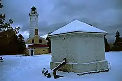 Lighthouse and oil house in February
