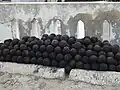 Cannonballs at Cape Coast Castle, a structure used in the Trans-Atlantic Slave Trade.