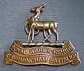 Cap badge, 16th (Service)(3rd Birmingham) Bn Royal Warwickshire Regiment, 1914 - 1919. Note - this is not an original.