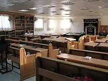 Interior of a "caravan shul" (synagogue housed in a trailer-type facility), Neve Yaakov, Jerusalem