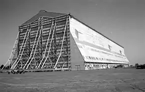 One of the two Cardington sheds with people in the foreground for scale.