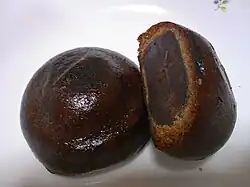 Manjū is a popular traditional Japanese confection; most have an outside made from flour, rice powder and buckwheat and a filling of red bean paste, made from boiled azuki beans and sugar.