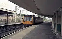 A Class 142 Pacer heading towards Carlisle, photographed in June 1998