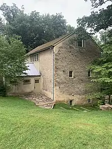 A picture of the carriage house in Saunders Woods (take in July, 2021)