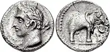 Image of both sides of a coin: one depicting a man's head; the other an elephant
