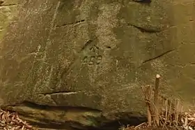 Rock carving created by convict work gang, probably around 1829; it is only a short distance from the beginning of the Great North Road at Parramatta Road