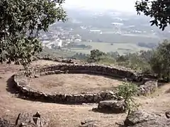 Large communitarian building with built-in bench in Citânia de Briteiros (Norte Region)