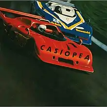 Casiopea album cover with two race cars
