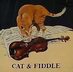 Cat standing on a table with a fiddle and sheet music, from a pub sign as seen in 2009