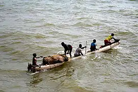 Indian split-log fishing canoe