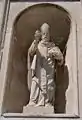 Statue of Saint Blaise on a niche