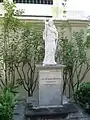 Statue of the Good Shepherd on the grounds of the cathedral. Reinstalled in the new basement crypt