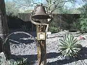 The bell of the First Church of Cave Creek.