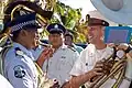 A member of the Royal Samoan Police Band with a member of the Pacific Fleet Band.