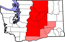 Map of Central Washington. Counties highlighted in red are always included, while counties highlighted in pink are sometimes included.