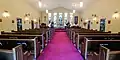 This Anglican chancel delineates the standard practice of the pulpit being located in the Gospel side and the lectern being located in the Epistle side.