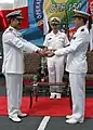 Commodore Hasham bin Saddique taking over the command of CTF-150 from the U.S. Navy at the Tippu Sultan in 2008.