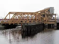 A truss bridge with a train passing over it