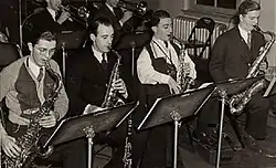 Don Raffell on far right in the Charlie Spivak sax section, 1941