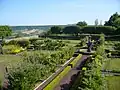 The lower terrace, with its kitchen garden and the fountain from 1617