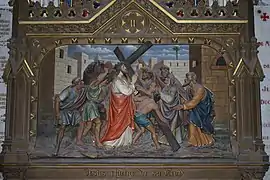 Jesus is given his cross
