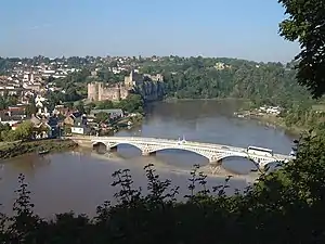 The castle and 1816 road bridge across the River Wye, seen from Tutshill