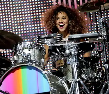 Simple Minds drummer Cherisse Osei playing live