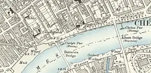 Map showing a riverside road and bridges