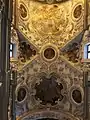 Baroque ceiling decorated with stuccoes and paintings