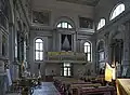 Interior towards entrance with organ.