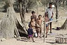 Bushmen children with their father