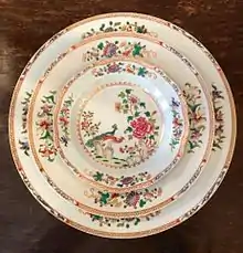 A set of medallion, rice dish, and dinner plate of the Double Peacock Dinner Service, famille rose