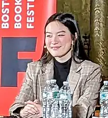 Chloe Gong speaking in 2023 at the Boston Book Festival