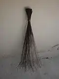 broom made of the stem of coconut leaf