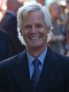 Chris Carter in a suit.