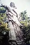 Christ's Sermon on the Mount, sculpted by Ilongot-Igorot (Isinay stock) sculptor Anselmo Day-ag, in 1978 and erected on a mountain grotto park in 1981 by the Philippine Tourism Authority through the initiative of the late Tourism Minister and Assemblyman Jose D. Aspiras and then General Manager Bernardo Vergara in Francia Sur overlooking the Marcos Highway. It was Day-ag's version of the original art deco statue of Christ the Redeemer in Brazil. The statue collapsed and fell during the July 16, 1990, earthquake and still remains buried in rubble and dirt on the mountain slope.