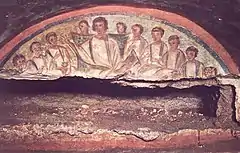 Christ teaching the Apostles, repeating pagan scenes of philosophers with their pupils, Catacombs of Domitilla, Rome